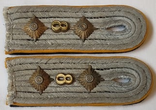Pair of Waffen-SS officers shoulder boards to SS-Hauptsturmführer...