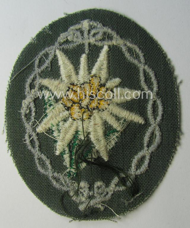 'Variant'-pattern WH (Heeres) 'Gebirgsjäger'- (ie. mountain-troopers-) related arm-badge, being a desirable example as was executed in the machine-woven pattern on a thin-shaped background