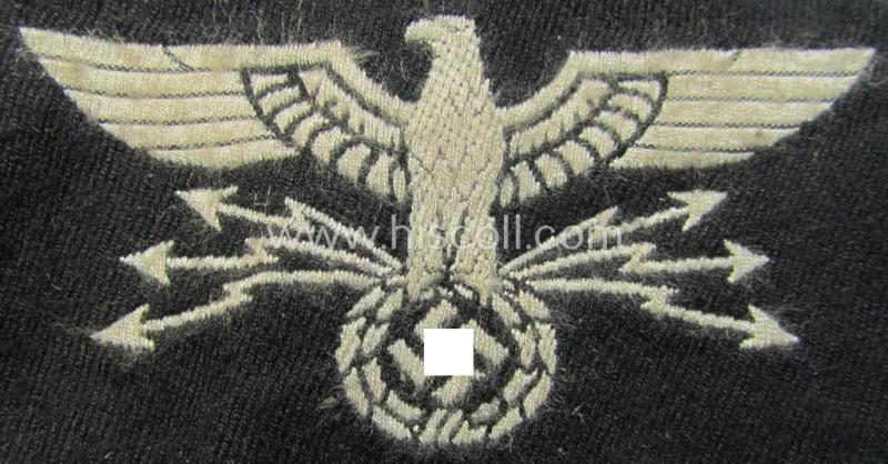 Superb - I deem 'variant'-pattern! - 'Postschutz'-arm-badge (ie. arm-eagle) being a piece as executed in the 'BeVo'-weave-pattern onto a black-coloured background and that comes in a moderately used- (ie. clearly tunic-removed-), condition