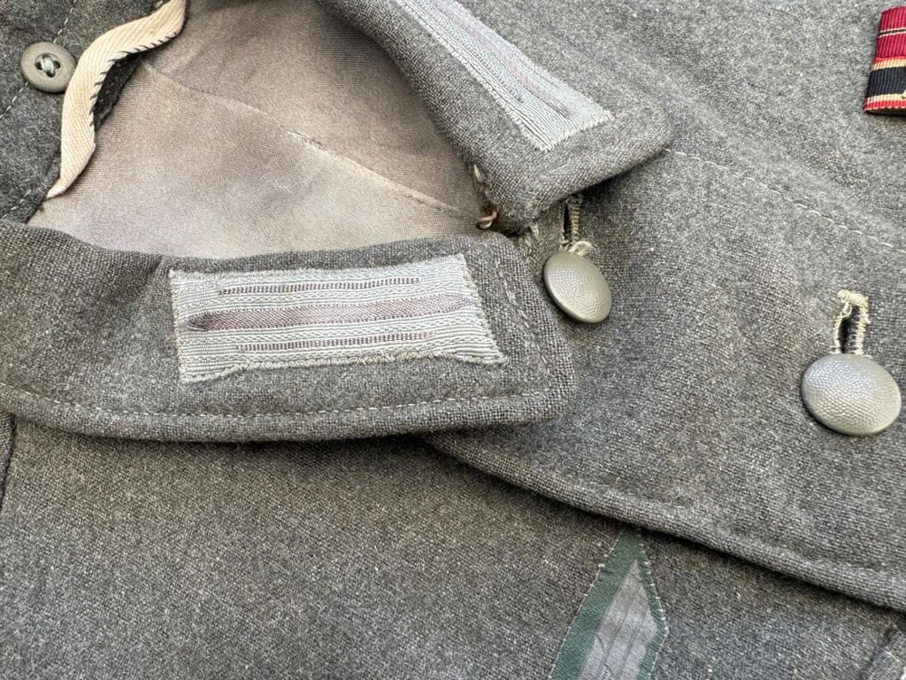 Wehrmacht Heer M43 EM field tunic With Original Applied Insignia