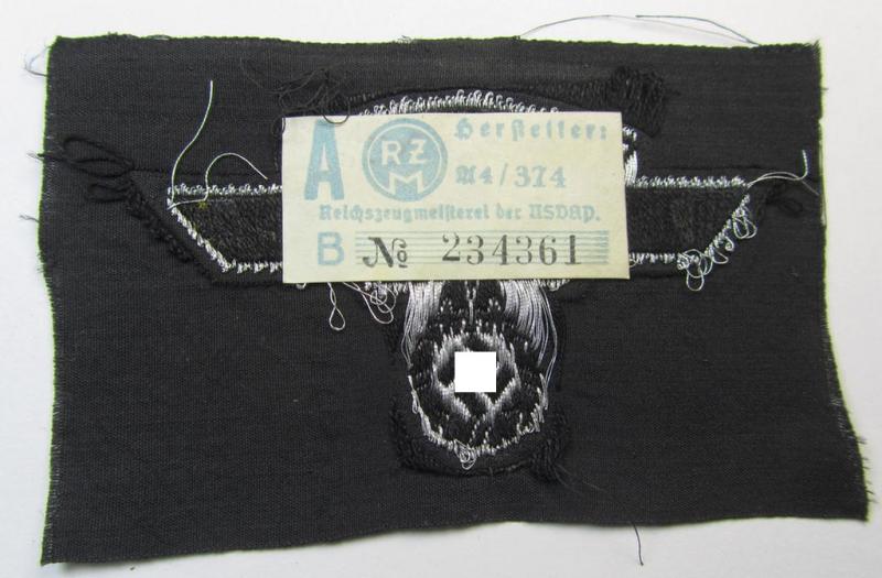Attractive and typically 'BeVo flat-wire'-woven, so-called: N.S.K.K. (ie. 'National Socialistisches Kraftfahr Korps') arm-eagle being a very detailed- and/or 'virtually mint' example that still retains its period-attached 'RzM'-etiket