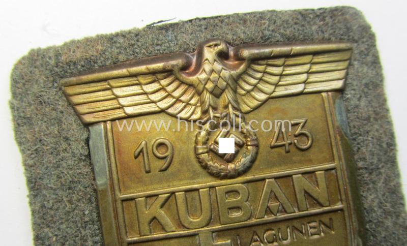 Very attractive - and actually scarcely encountered! - WH (Heeres ie. Waffen-SS) 'Kuban'-campaign-shield that comes mounted onto its original field-grey-coloured- and/or woolen-based 'backing'