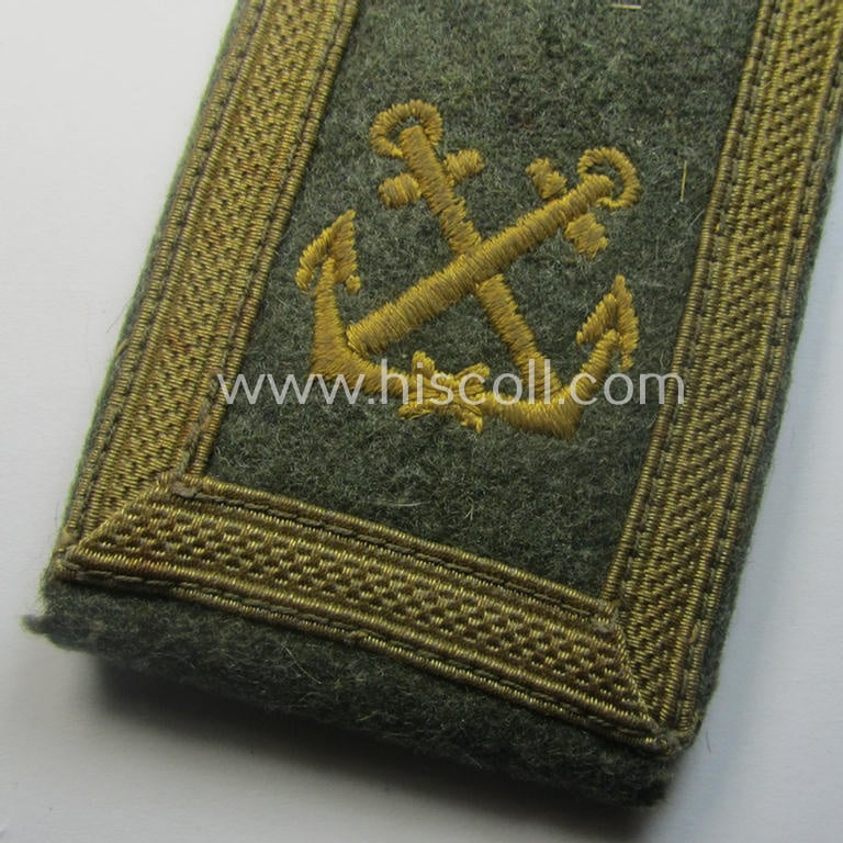 Single, 'cyphered'- (and I deem early- ie. mid-war-period) WH (Kriegsmarine) NCO-type shoulderstrap as was intended for usage by an: 'Unteroffizier eines Küsten-Artillerie-Abtlgs.'