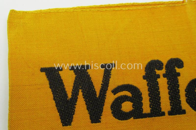 Superb, golden-yellow-coloured- and/or linnen-based armband (ie. 'Armbinde') entitled: 'Waffen-SS' that comes in an overall very nice- (albeit moderately used ie. worn-), condition