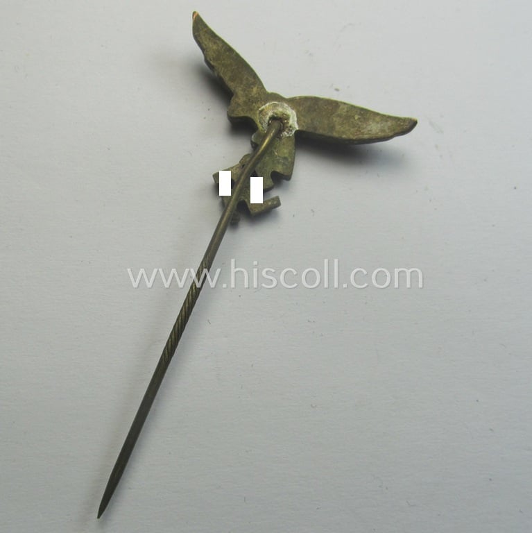 Tarnished golden-toned lapel-pin (ie. 'Zivilabzeichen') to be worn on the civil attire as was intended for usage by the various staff-members of the 'Luftwaffe' (depicting an early-pattern- ie. 'down-tailed'-eagle)