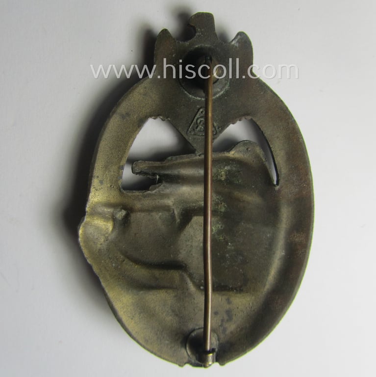 'Panzerkampfabzeichen in Bronze' (or: bronze-class panzer-assault badge or PAB) being a clearly maker- (ie. 'AS' in a triangle-) marked- and/or typical zinc- (ie. 'Feinzink'-) based specimen as was procuced by a to date unknown maker