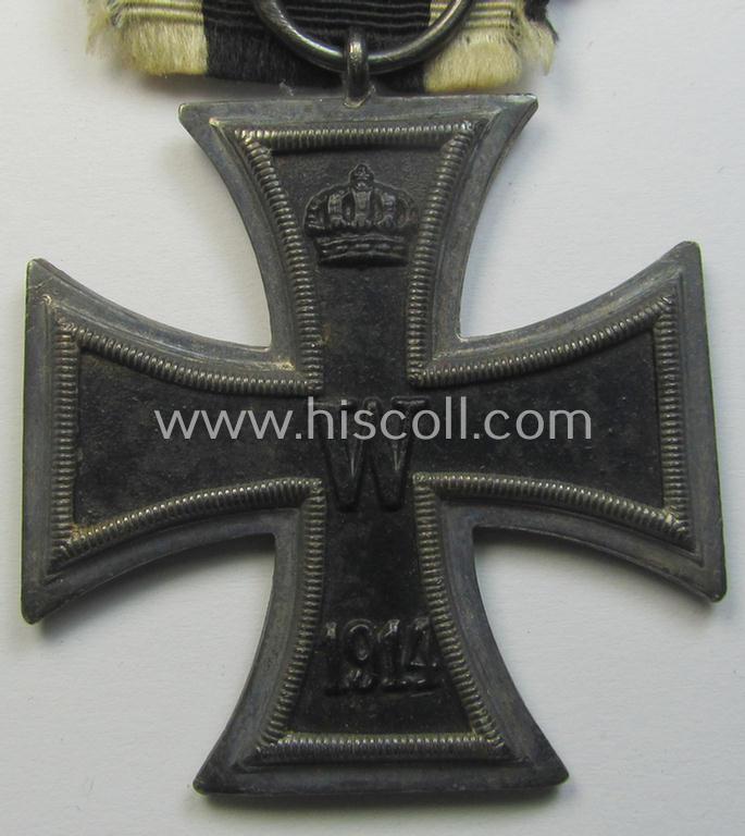 Attractive, WWI-period: 'Eisernes Kreuz II. Klasse' (or: iron cross second class) being a neatly maker- (ie. 'KO'-) marked example that comes mounted onto its confectioned (and longer-sized!) ribbon (ie. 'Bandabschnitt')