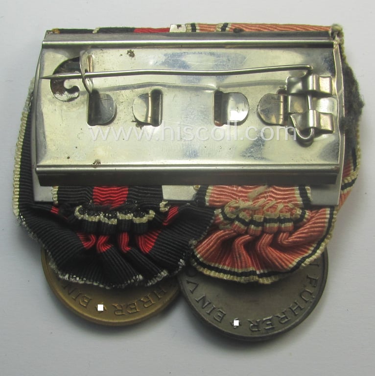 2-pieced, WH (Heeres o. Kriegsmarine) medal-bar (ie.: 'Doppelspange') showing resp. an Austrian and Czech 'Anschluss'-medal (which latter comes with a firmly attached 'Prager Burg-Spange')