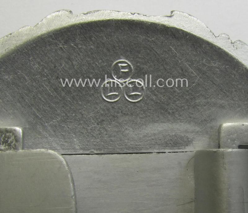 'Virtually mint', WH (Kriegsmarine) 'standard-issue'-pattern, silver-toned- and/or typical aluminium-based officers'-dress-model belt-buckle (ie. 'Paradefeldbinde für Beambten der KM') being a neatly maker- (ie. 'F.L.L.'-) marked example