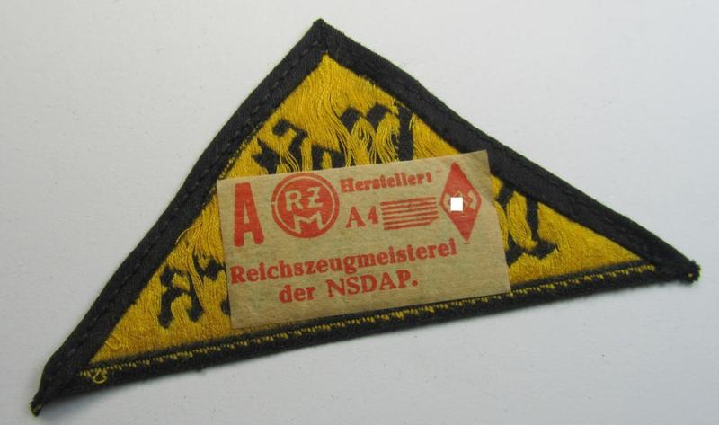 Neat, HJ/BDM ('Hitlerjugend' ie.: 'Bund Deutscher Mädel') district-triangle (ie. 'Gebietsdreieck') entitled: 'West Westmark' (being a 'virtually mint- ie. unissued' example that still retains its period-attached 'RzM'-etiket)