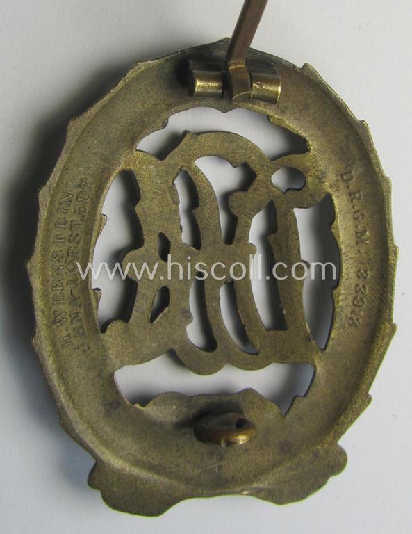 Attractive - and early-period! - 'Reichssportabzeichen DRA in Bronze' (or: bronze-class DRA sports'-badge) being a neat 'Buntmetall'-based example that is nicely maker- (ie. 'Wernstein - Jena'-) marked on its back