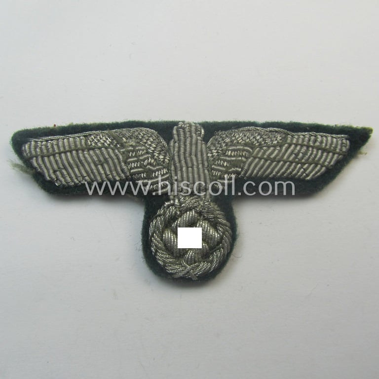 Clearly used- and/or cap-removed, WH (Heeres) officers'-pattern, visor-cap eagle/cocarde-set (ie. 'Effektensatz für Schirmmütze') being both hand-embroidered examples that come mounted onto a darker-green-coloured- and/or woolen-based background