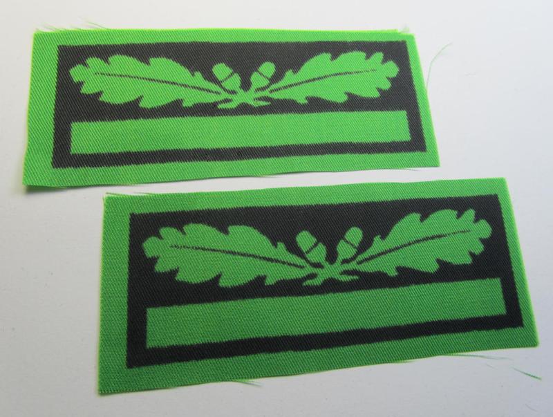 Attractive - and fully matching! - pair of officers'-pattern, WH (Heeres o. Waffen-SS) rank-insignia-bars (for usage on the various camouflaged-uniforms) as was used by an officer holding the rank of: 'Leutnant' (ie.: 'SS Untersturmführer')