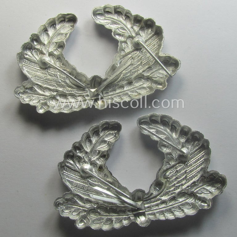 BZP (ie. 'Bahnschutz-Polizei') officers'- (ie. NCO-) type visor-cap-cocarde (ie. 'Metall-Kokarde für Schirmmütze der Uffz. u. Offiziere des BZP') as executed in silverish-toned aluminium-based metal