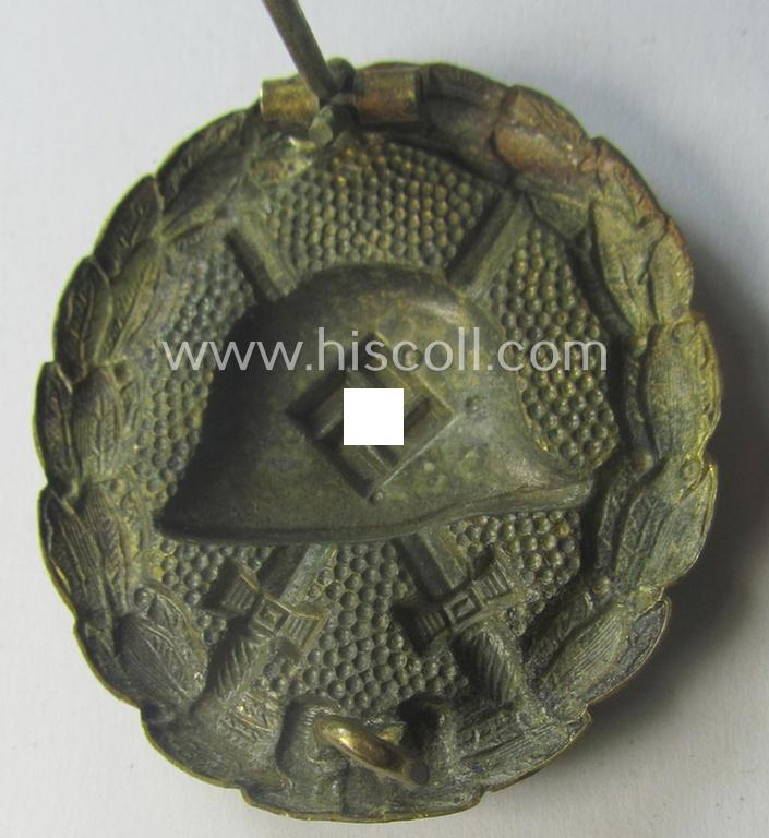 Luxuriously-styled, early-pattern silver-class wound-badge (ie.: 'Verwundeten Abzeichen in Silber') being a detailed so-called: 'Spanish Civil-War'-version that comes in a just moderately used- and/or worn, condition