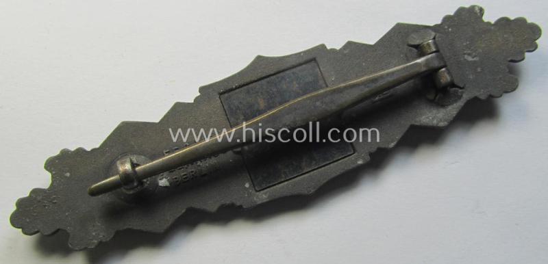 Superb, 'Nahkampfspange in Bronze' (or: bronze-class close-combat clasp ie. CCC) being a neatly maker-marked- and/or minimally converse-shaped specimen as was produced by the: 'JFS'- (ie. 'Joseph Feix u. Söhne'-) company