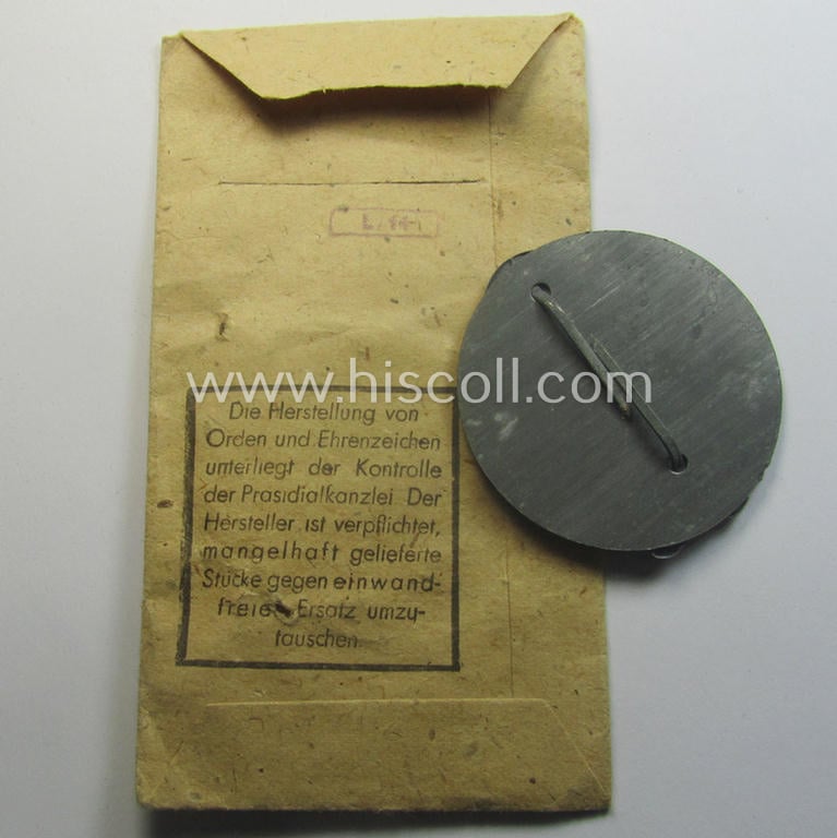 WH (Heeres, LW ie. Waffen-SS-) so-called: 'Kraftfahrbewährungs-Abzeichen in Silber' being a 'virtually mint' example as was produced by the maker: 'Friedrich Orth - Wien IV/56' (ie. 'L/14') and that came stored in its 'Zellstoff'-based pouch