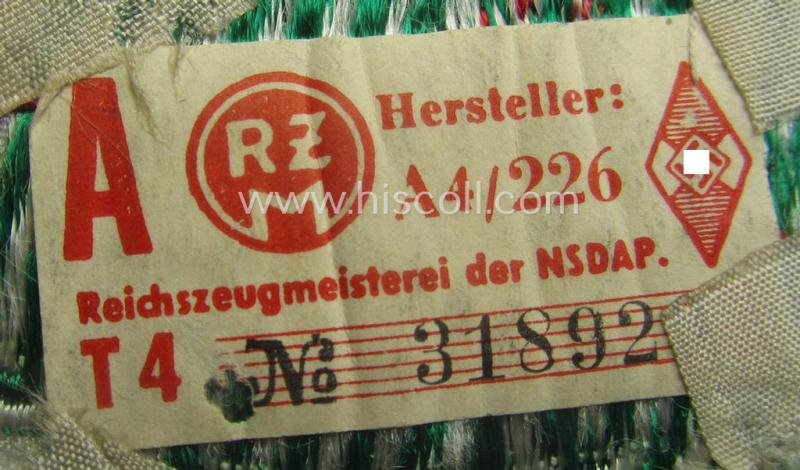 HJ/BDM (ie. 'Hitlerjugend'/'Bund Deutscher Mädel') trade- ie. specialist-armbadge as executed in neat 'BeVo'-weave pattern as was specifically intended for a: 'Gefolgschaftsfeldscher' that still retains its 'RzM'-etiket