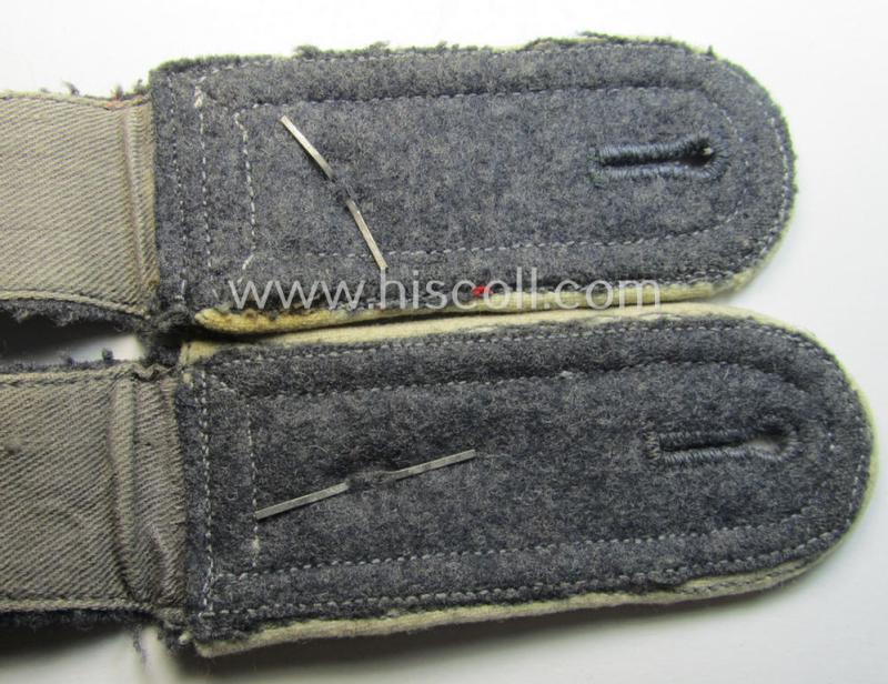 Pair of WH (Luftwaffe) white-piped, so-called: 'Hermann Göring'-division, NCO-type shoulderstraps: 'Fwbl. u. Mitglied der Hermann Göring Division'