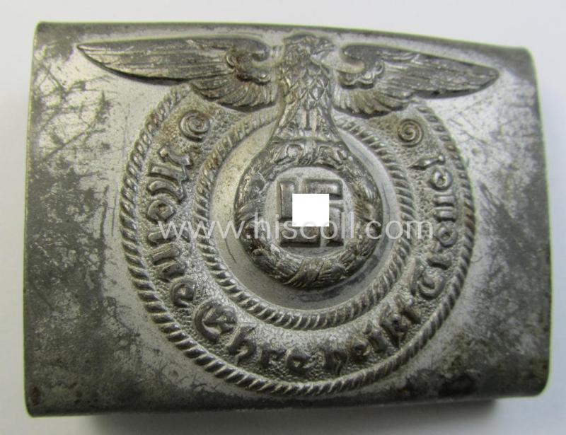 Attractive, Waffen-SS enlisted-mens'- (ie. NCO-) type belt-buckle (being a typical, unmarked and typical steel-based: 'Overhoff & Cie'-example) that comes in a surely issued- and/or moderately used- ie. worn, condition