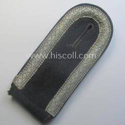 Single, Waffen-SS, NCO-type shoulderstrap as piped in the...