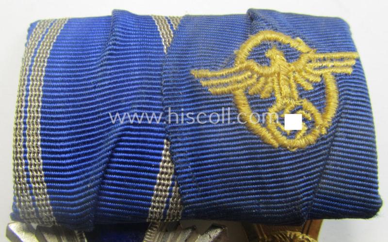 2-pieced, N.S.D.A.P.- and/or: 'Polizei'-related) medal-bar (ie. 'Spange') showing resp. a: 'N.S.D.A.P.-D.A. in Silber' (ie. '2. Stf. für 15 Jahre t.D.') and 'Pol.-Dienstauszeichnung 1. Stf.' that both come period-mounted as a: 'Doppelspang...