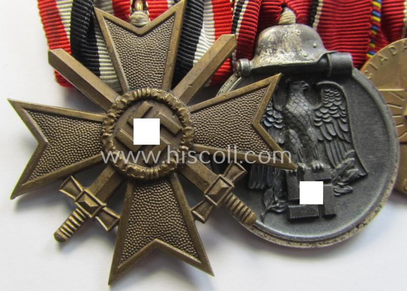 Superb, 3-pieced WWII-period medal-bar (ie. 'Ordenspange') showing respectively a: 'KvK II.Kl. mit Schwertern', an: 'Ost'-medal and a WWII-period, Romanian medal: 'Kreuzzug gegen den Kommunismus'