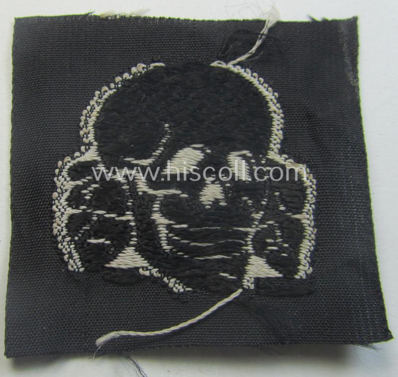 Waffen-SS, 'BeVo'-woven-style skull (ie. 'Totenkopf für Schiffchen o. Einheitsfeldmütze') that comes in a simply never used- (ie. virtually mint- and/or never confectioned-), condition