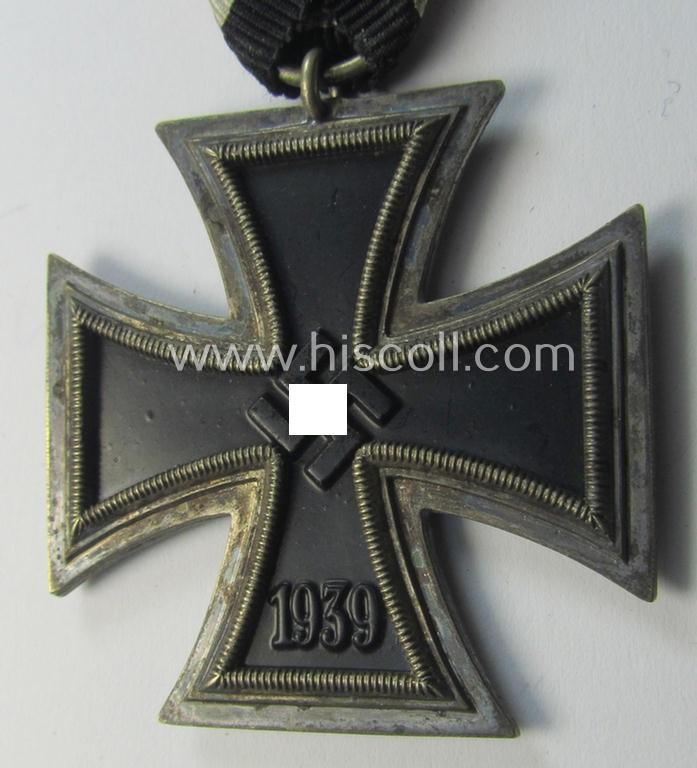 Neat, Iron Cross 2nd class (or: 'EK II. Klasse') being a non-maker-marked example that comes mounted onto its original (Austrian-styled!) ribbon (ie. 'Bandabschnitt') as was (I deem) produced by the (Austrian-based) company named: 'Rudolf Souval...