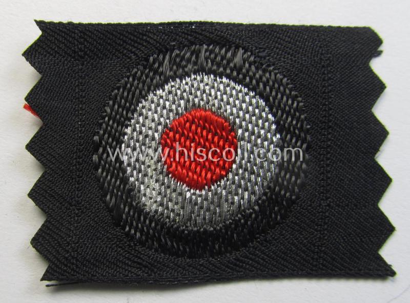 Superb - and rarely found! - WH (Heeres) Pz-cap-cocarde as executed in flatwire 'BeVo'-weave pattern onto a black-coloured background as was intended for usage on the black-coloured Pz-officer-type side-caps (ie. 'Schiffchenmützen')