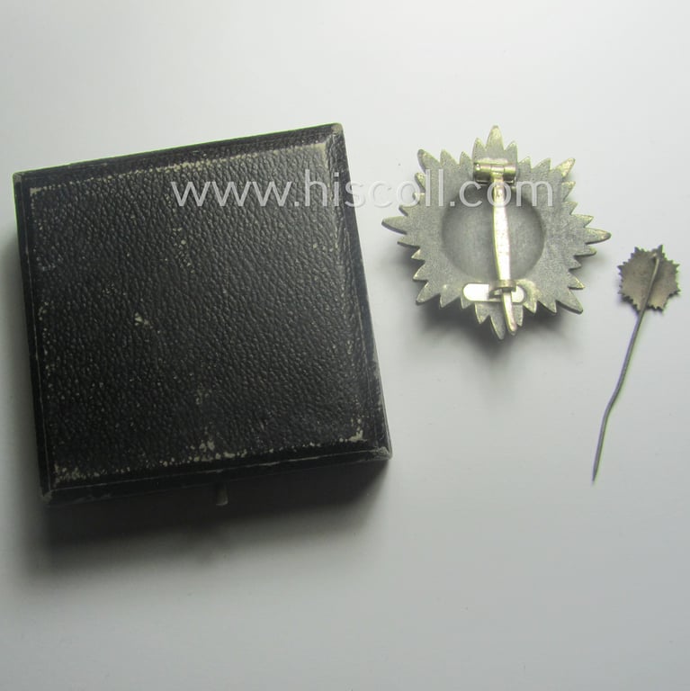 WH-related, so-called: 'Verdienstauszeichnung o. Steckkreuz für Angehörige der Ostvölker, 2. Kl. in Silber ohne Schwertern' being a (dual!) maker- (ie. '100' & 'L 55'-) marked example that comes stored in its accompanying, period-etui