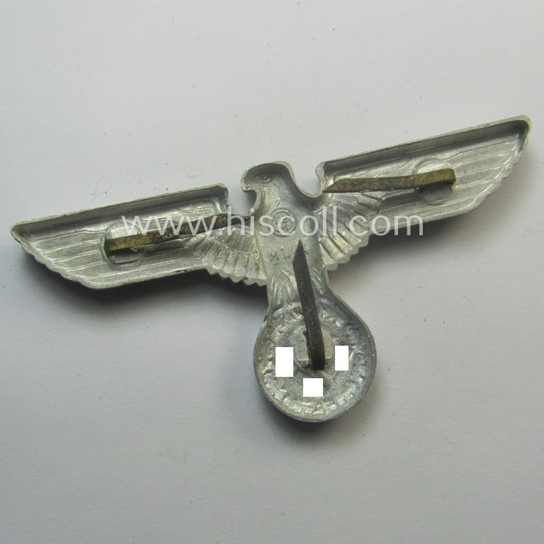 Bright-silver-coloured- and/or: aluminium-based (political-style) visor- (ie. 'Schirmmützen'-) cap-eagle being a detailed and neatly: 'RzM' and/or: 'M1/44' marked example