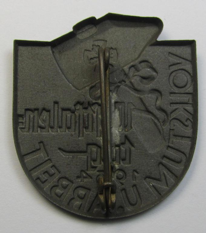 Silverish-grey-toned, tin-based so-called: 'DAF'-related 'tinnie' being a non-maker-marked example depicting a stylised hammer and rounded-swastika coupled with the text: 'Westfalentag - Volkstum u. Arbeit - 1934'