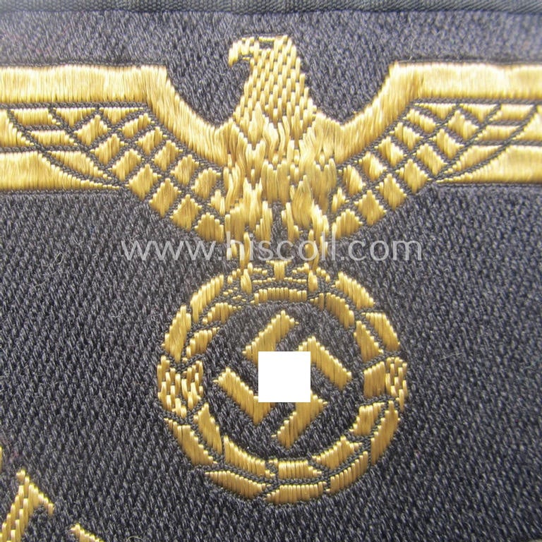 RB- ('Reichsbahn'-) related arm-eagle as executed in 'BeVo'-weave style, as was intended for an official of the: 'Deutsche Reichsbahn' ie. the: 'RVD Kiew' (or: 'Reichsverkehrsdirektion Kiew')