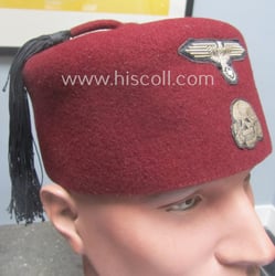 Superb, maroon-red-coloured, Waffen-SS-pattern so-called: 'Fez' having a neat...