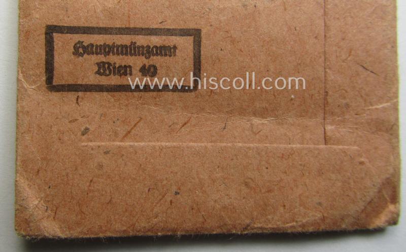 Empty 'Zellstoff'-based pouch as was intended for a medal: 'Winterschlacht im Osten 1941/42' as was produced by the company: 'Hauptmünzamt - Wien' (ie. 'Hersteller 30')