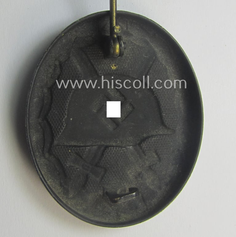 Moderately used- and/or worn, black-class wound-badge (or: 'Verwundeten-Abzeichen in Schwarz') being a typical (early!) non-magnetic and/or non-maker-marked example