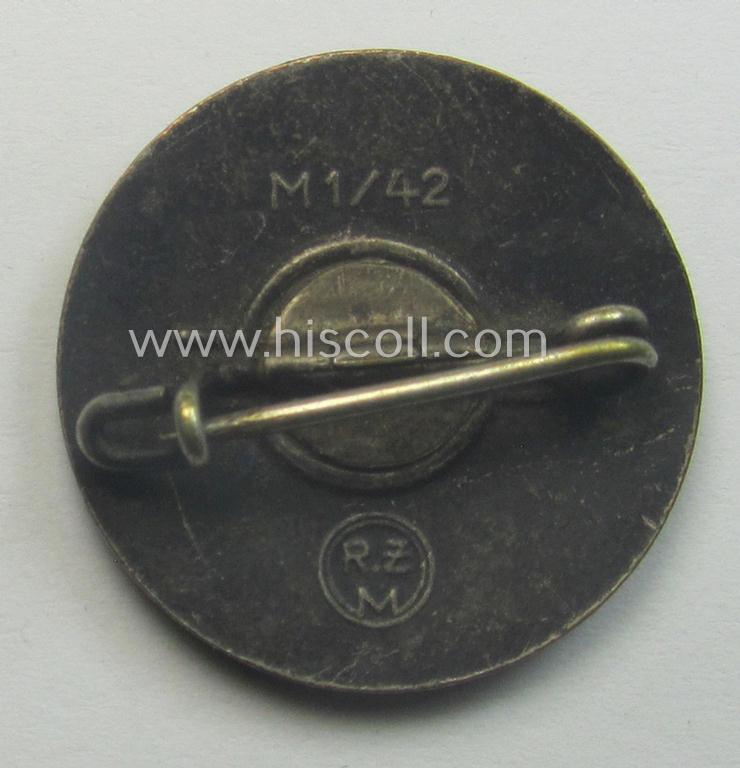 'N.S.D.A.P.'-membership-pin- ie. party-badge (or: 'Parteiabzeichen') showing the makers'-designation: 'RzM' and/or: 'M1/42'