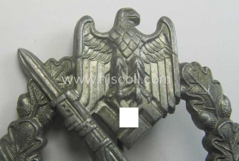 Silver-class 'Infanterie Sturmabzeichen in Silber' being a (typically) unmarked so-called: 'pillow-crimped'-pattern example as was executed in silverish-coloured, zinc-based metal (ie. 'Feinzink')