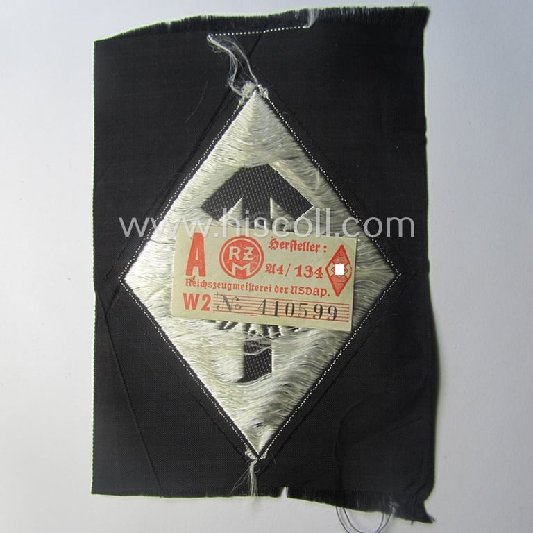 HJ- (ie. 'Hitlerjugend') 'Leistungsabzeichen in Silber in Stoff' that retains its 'RzM'-etiket