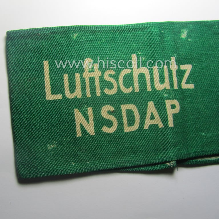 Minimally used - and most certainly rarely seen! - 'N.S.D.A.P.'- (ie. 'Luftschutz'-) related armband (ie. 'Armbinde') being of the 'entirely printed'-type showing a swastika and text: 'Luftschutz NSDAP'