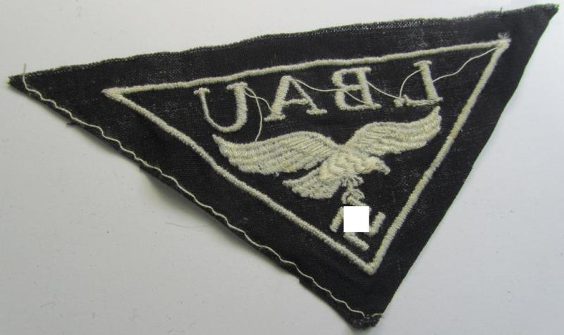WH (Luftwaffe)-related- (EM- ie. NCO-pattern-) machine-embroidered breast-badge ie. eagle-device showing the text: 'L. Bau' as was (I deem) specifically intended for staff working within the WH 'Generalluftzeugmeister'- (ie. 'GL'-) organisation