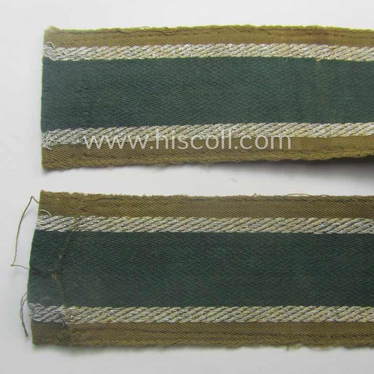 'BeVo'-like cuff-title (ie. 'Ärmelstreifen') entitled: 'Afrikakorps' being a clearly issued example that comes in an overall nice- (ie. hardly shortened- and just moderately worn-), condition