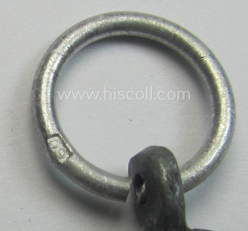 'Luftschutz-Ehrenzeichen 2. Stufe' being a clearly maker- (ie. '60'-) marked example as executed in zinc-based metal (ie. 'Feinzink') as was produced by the maker: 'Katz u. Deyhle'