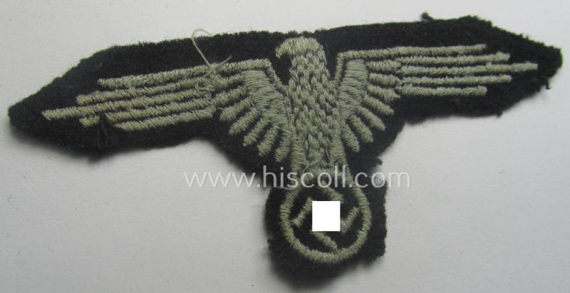 Clearly used- and/or tunic-removed, 2-pieced 'SS'- (ie. 'Waffen-SS'-) insignia-set comprising of a so-called: 'RzM'-type EM- (ie. NCO-) pattern arm-eagle and/or rank-chevron as was intended for usage by an: 'SS-Rottenführer'