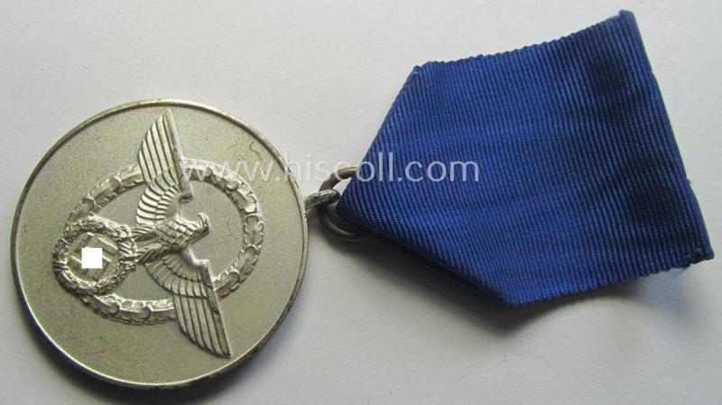 Bright-silver-toned so-called: 'Polizei-Dienstauszeichnung 3. Stufe' (or: police loyal-service medal 3rd class) that comes mounted onto its period ribbon (ie. 'Bandabschnitt') and that comes stored in its green-coloured etui