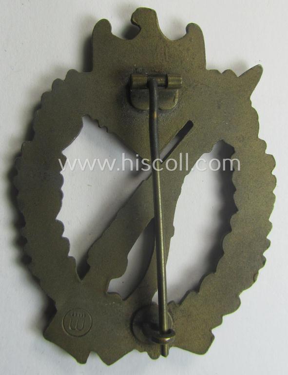 'Infanterie Sturmabzeichen in Bronze' (or: bronze-class infantry assault-badge ie. IAB) being a maker- (ie. 'ÜÜ'- ie. 'E.F. Wiedmann') marked so-called: 'Lily Pad-hinge'-example as was executed in zinc-based metal