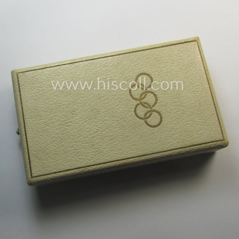 Superb, 'Deutsche Olympia-Erinnerungsmedaille 1936' being a non-maker-marked example that comes mounted onto its original ribbon (ie. 'Bandabschnitt') and that comes stored in its typical, beige-white-coloured etui