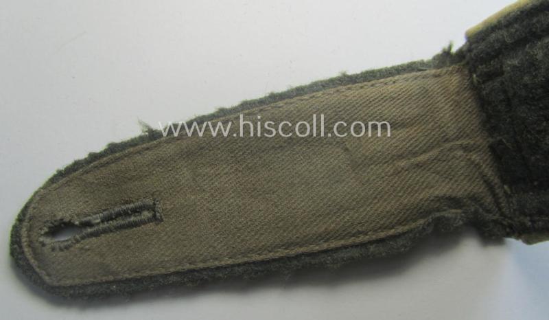 Single, WH (Heeres) NCO-type (ie. 'M40'- ie. 'M43'-pattern) shoulderstrap having the white-coloured branchcolour as was intended for - and clearly worn by! - an: 'Oberfeldwebel der Infanterie-Trpn.'