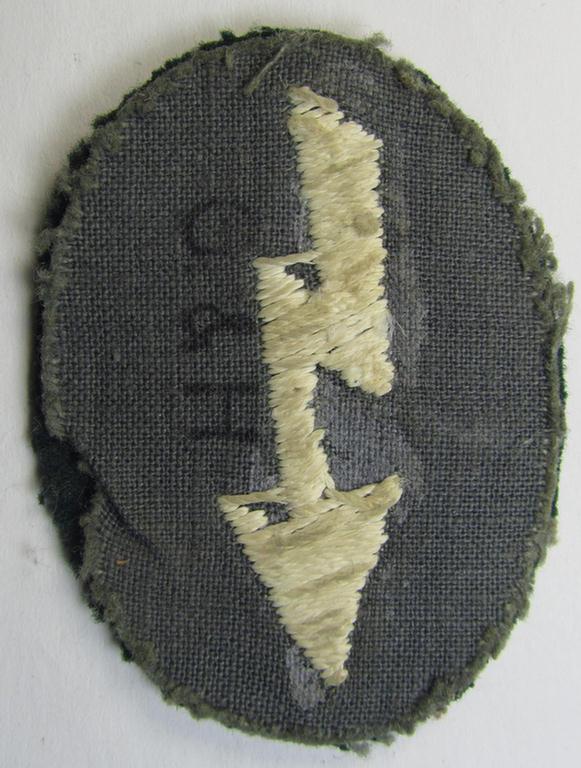 Clearly used- & tunic-removed WH (Heeres) trade- and/or special career insignia ie. hand-embroidered signal-blitz (being a neatly maker-marked example as executed in white) as was intended for a soldier serving within the: 'Infanterie-Truppen'